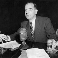 U.S. Senator Joseph McCarthy testifies before a Senate subcomittee on elections and rules in an effort to link fellow U.S. Senator William Benton to communism, 1950s.