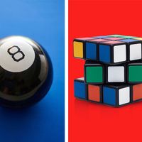 (Left) Ball of predictions with answers to questions based on the Magic 8 Ball; (right): Rubik's Cube. (toys)