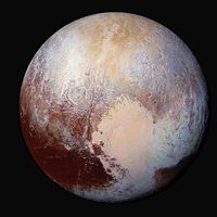 Scientists combine four images from New Horizons Long Range Reconnaissance Imager (LORRI) with Ralph instrument infrared images to create this false color global view of dwarf planet Pluto on July 14, 2015, 280,000 miles away from the spacecraft.