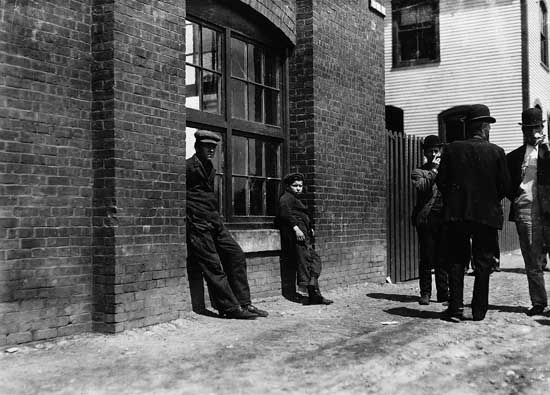 workers on break outside Green City Mill