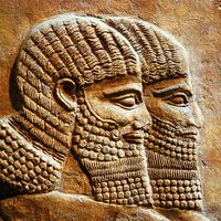 Relief sculpture of Assyrian (Assyrer) people in the British Museum, London, England.