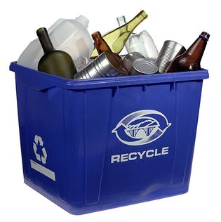 Plastic, glass, and metal containers in a recycling bin.