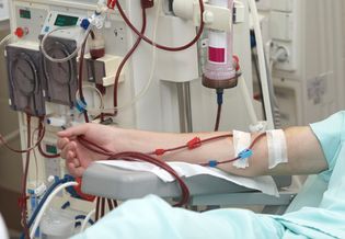 Patient undergoing dialysis treatment.