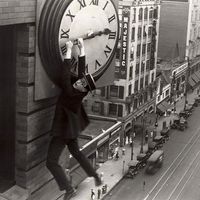 Publicity still showing Harold Lloyd from the motion picture film "Safety Last!" (1923); directed by Fred Newmeyer and Sam Taylor. (movies, cinema)