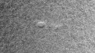 Observe a dopplergram showing the velocity of solar material in the photosphere captured by the Helioseismic and Magnetic Imager