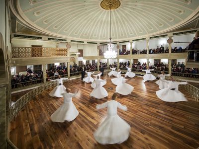 Sufi dervishes performing a ritual dance, Konya, Turkey.