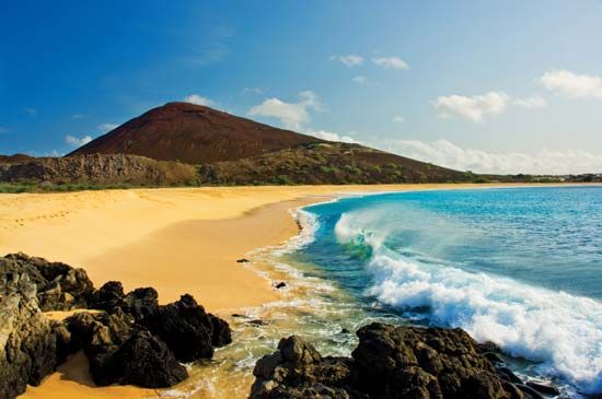 Beach and volcanic rocks, Ascension Island, South Atlantic Ocean.