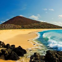 Beach and volcanic rocks, Ascension Island, South Atlantic Ocean.