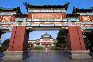 Gateway leading to the Great Hall of the People (centre background), central Chongqing, China.