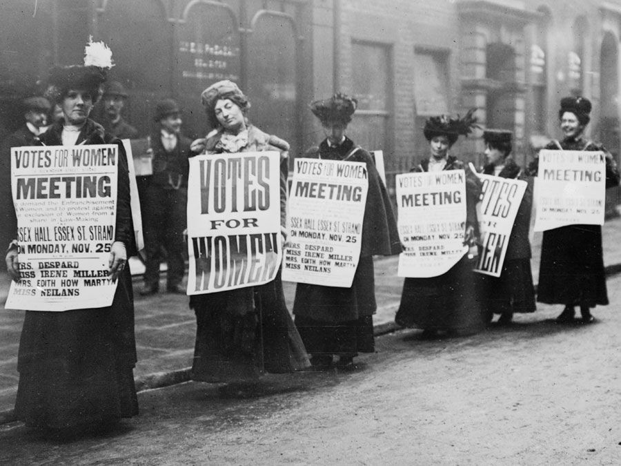 Suffragettes with signs in London, possibly 1912 (based on Monday, Nov. 25). Woman suffrage movement, women's suffrage movement, suffragists, women's rights, feminism.