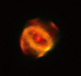 Planetary Nebula Hen 1357, as photographed by the Hubble Space Telescope. It is located about 18,000 light-years from Earth and lies in the constellation Ara the Altar. This expanding cloud of gas was expelled from an aging star in the nebula's centre.