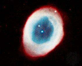 Ring Nebula (M57, NGC 6720) in the constellation Lyra, a planetary nebula consisting mainly of gases thrown off by the star in the centre.