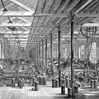 Vintage engraving from 1878 of the spinning room in Shadwell Rope Works. View of the factory floor. Industrial revolution