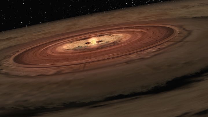 View an animation of a brown dwarf surrounded by a swirling disk of planet-building dust