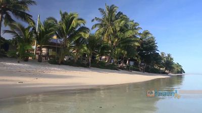 Visit a traditional fale (open-sided house) on the island of Savai‘i, Samoa