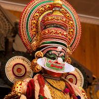 Kathakali dancer performing on stage in Kerala, India. (dancing, performing arts)