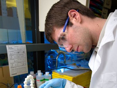 technician using a pH meter