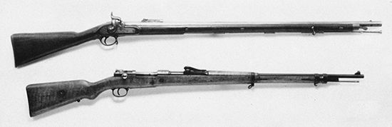 British Enfield Pattern 1851 (top), a percussion-ignition, Minié-type muzzle-loader, and German 1898 Mauser (bottom), a bolt-action, magazine-fed repeater.