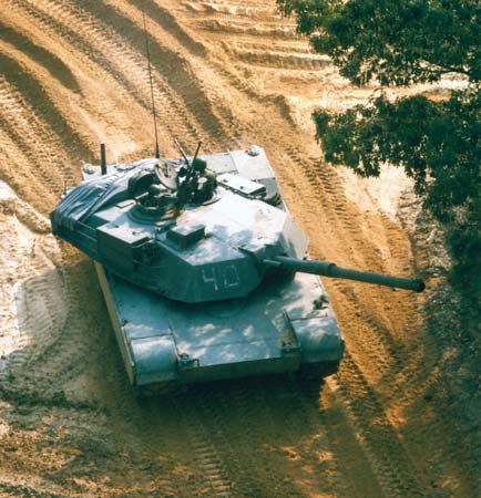 A U.S. M1A1 tank—essentially an M1 Abrams main battle tank with a 120-mm gun adapted from the West German Leopard 2 M1A1 and powered by a gas turbine engine.