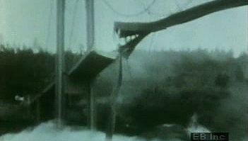 Witness the Tacoma Narrows bridge collapse into Puget Sound between the Olympic Peninsula and the Washington mainland