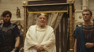 Tom Hughes as Titus, Anthony Hopkins as Emperor Vespasian and Jojo Macari as Domitian in Those About to Die