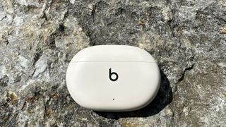 Beats Studio Buds Plus on a rock