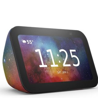 A product render of the Amazon Echo Show 5 Kids showing the time with a galaxy background