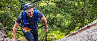 TJ Fink wearing the Omorpho G-Vest on a trail run