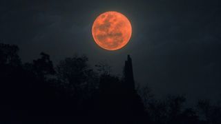 The moon turns red during a lunar eclipse, such as this one seen in Thailand one Jan. 31 2018.