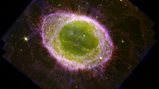 Imagine taken by the James Webb Space Telescope of the Ring Nebula (Messier 57). It looks like a glowing green eye surrounded by purple gas.