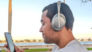 Our reviewer testing the Bose 700 call quality outside