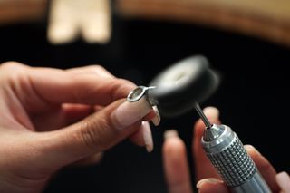 Making Grillz teeth jewels at a jewellery making class in London