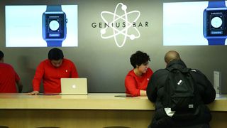 Genius Bar employees wearing red