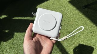 Journey AXIE 3-in-1 portable charger on grass