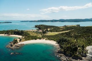 view of island surrounded by blue water in auckland