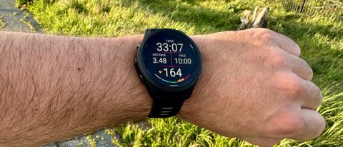 Garmin Forerunner 265 showing stats during a run