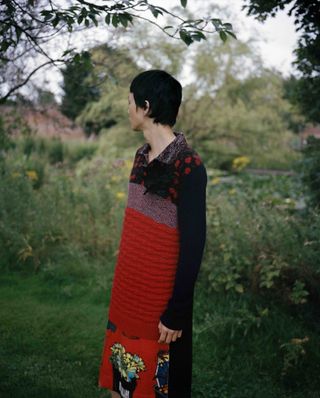 Model wears colourful dress