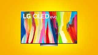 LG C2 OLED TV on yellow background