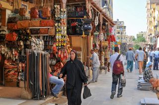 Shoppers stroll through the central market in Aswan, in southern Egypt.