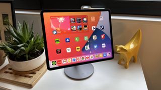 Benks Infinity Pro Magnetic iPad Stand on a white dresser