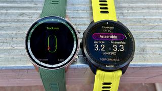 The OnePlus Watch 2R (left) and Garmin Forerunner 965 (right)