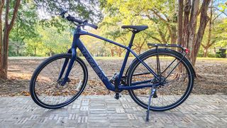 Trek FX+ 2 eBike parked on a sidewalk