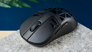 A black Keychron M3 Mini 4K Metal wireless gaming mouse