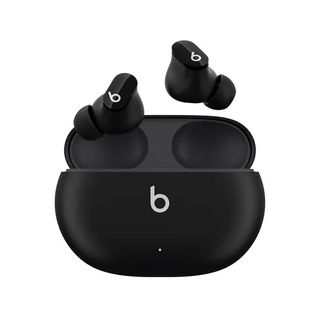 A black pair of Beats Studio Buds earbuds in their charging case.