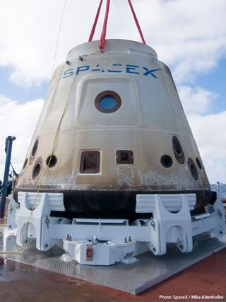Photo of actual Dragon spacecraft after its first successful orbital flight.