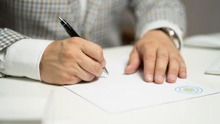 Person signing a document