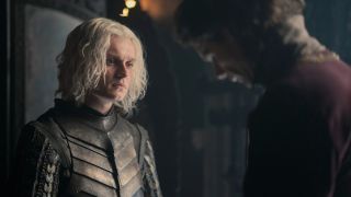 Aegon looking sad and at Larys in House of the Dragon.