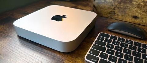 Mac mini on a wooden desk