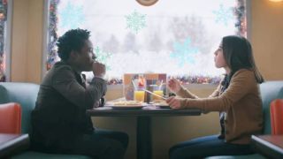 Isabela Merced and Shameik Moore in Let It Snow