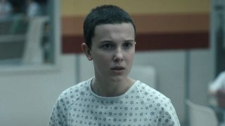 Eleven in hospital gown inside Hawkins National Laboratory in Stranger Things Season 4